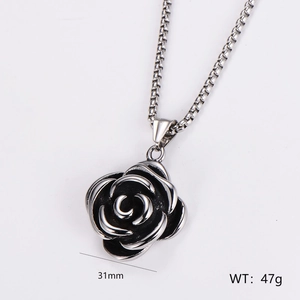Detail of 31mm black rose pendant with silver outlines on box chain, weight 47g
