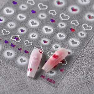 3D frosted nail art stickers with white hearts, butterflies and shell light effects