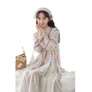 Mantella poncho in maglia stile etnico colorato con frange e design traforato moda