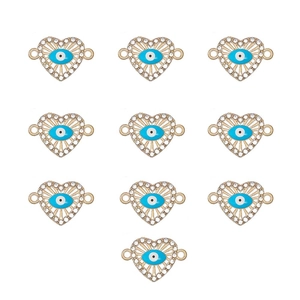 Detailed view of ten heart-shaped evil eye jewelry connectors with sparkling rhinestones