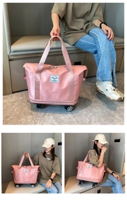 Pink large travel bag with universal wheels showing hand-carry and shoulder-back usage
