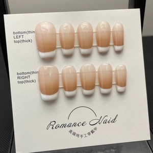 Handmade press-on nails featuring elegant French ombre gradient in a square-oval shape