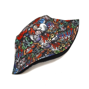 Close-up of street art graffiti pattern on cotton bucket hat with colorful print