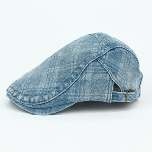 Classic washed denim flat cap in blue with adjustable side buckle and retro texture