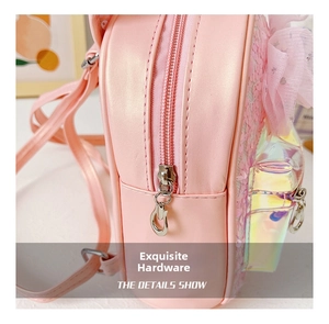 Detail shot of the durable metal zipper and sequins on the pink girls' bow backpack