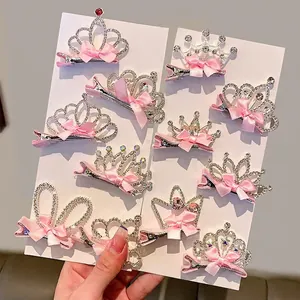 Sparkling silver tiara hair clips with pink satin bows and rhinestones for little girls