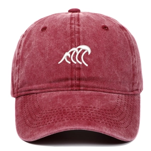 Vintage washed burgundy baseball cap with white wave embroidery and distressed cotton finish