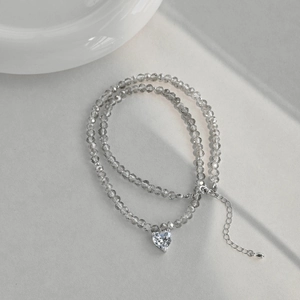 Detailed view of S925 silver heart necklace with grey faceted crystal beads and silver chain