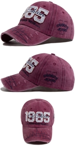 Detailed views of vintage burgundy baseball cap with 1985 embroidery and distressed brim
