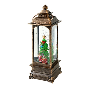 Vintage bronze Christmas lantern with lighted snow globe, Santa Claus and Xmas tree decor