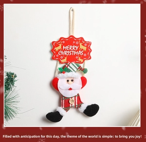 Detail of Santa Claus Christmas door hanging with a red Merry Christmas felt sign