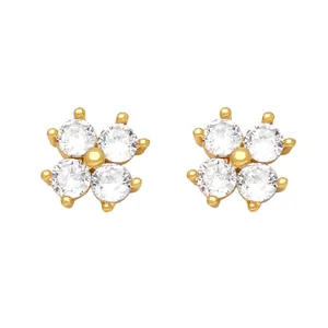 Close-up of gold flower stud earrings with four sparkling round-cut white zircons