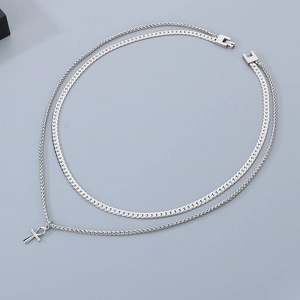 Detail of silver double-layered stainless steel necklace with Egyptian Ankh cross pendant