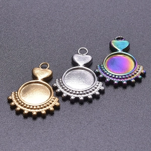Three heart-shaped DIY charms in gold, silver, and rainbow 18k plated stainless steel