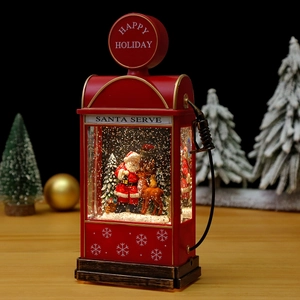 Retro gas station snow globe with Santa Claus, glitter lights, and holiday gift decor