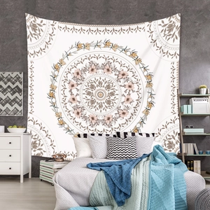 Detail of bohemian mandala wall tapestry as a warm bedroom background decoration