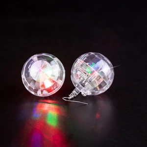 Colorful LED glowing disco ball earrings with retro 70s style and silver hooks for parties
