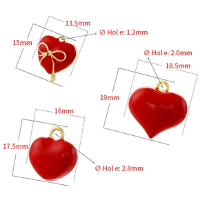 Three red heart bow pendants with dimensions and aperture sizes shown on white background