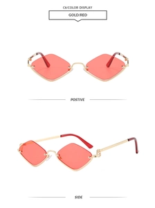 Vue détaillée des lunettes de soleil losange sans monture en métal doré et verres rouges