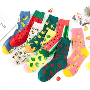 Close-up of vibrant fruit pattern cotton socks with bananas and strawberries