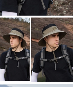 Detail of khaki outdoor sun hat featuring breathable black mesh and adjustable wind cord