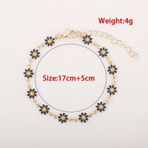 Golden daisy bracelet with blue flowers, 4g weight and 17+5cm adjustable chain size