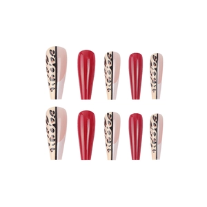 Long coffin false nails featuring red glossy finish and leopard print pattern design