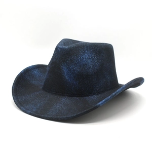 Detail of western cowboy hat showing dark blue shimmering textured fabric and wide brim