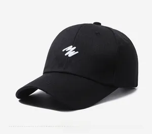 Detailed side view of a black cotton baseball cap with white embroidered wave logo