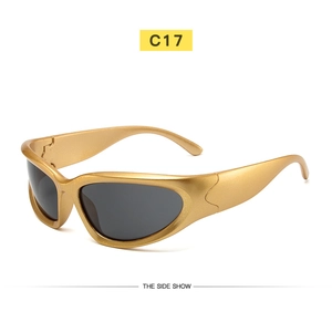 Detail view of champagne gold Y2K steampunk cycling sunglasses with sleek C17 design