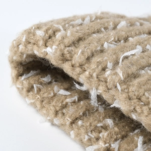 Winter khaki knitted beanie with plush white faux fur trim for warm outdoor headwear