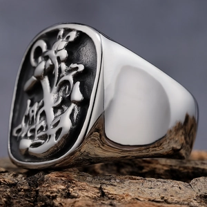 Retro punk stainless steel signet ring for men featuring detailed floral embossing