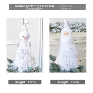 Detail of plush snowman and Santa tree topper hats with white fur and silver accents