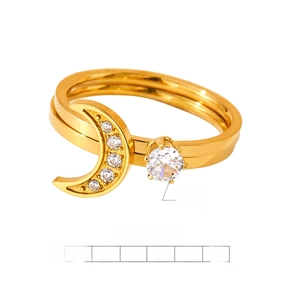 Macro shot of 2-in-1 crescent moon ring with sparkling cubic zirconia and gold finish