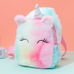 Detail of colorful gradient plush unicorn bag with shiny horn and closed eye embroidery