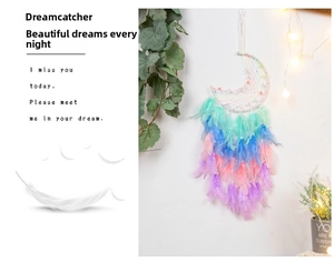 Detail of moon dreamcatcher with vibrant gradient feathers and delicate beaded accents