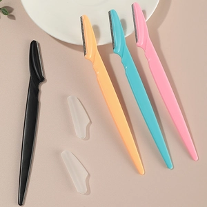 Set of four colorful portable eyebrow razors with safety net blades and protective caps