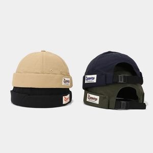 Adjustable cotton Miki hats in four colors with vintage Camping labels and brimless design
