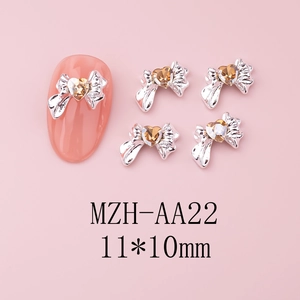 Charm per unghie con fiocco e gemma a cuore ambra in lega d'argento 11x10mm