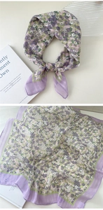Detailed view of floral cotton linen square scarf with purple flower and green leaf patterns