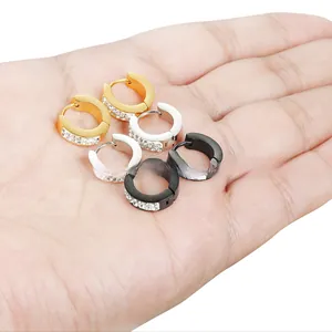 Three pairs of stainless steel hoop earrings in gold silver and black with cubic zirconia