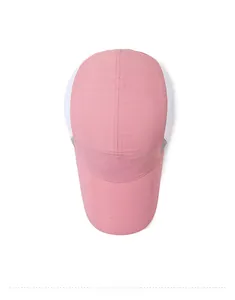 Top view of pink and white quick-dry sports cap featuring breathable mesh panels