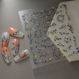 Adesivi per unghie 5D luci di Natale colorate con strass e perle su unghie sfumate pesca
