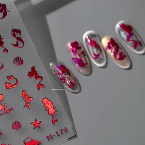 Detailed red laser mermaid and seashell gold stamping nail stickers with finished effect