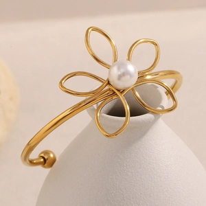 Bracelet jonf fleur en acier inoxydable doré 18 carats avec une perle blanche centrale