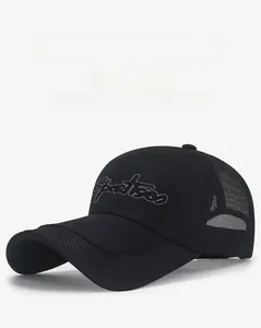Detail of the extended visor and breathable mesh fabric on this black baseball cap