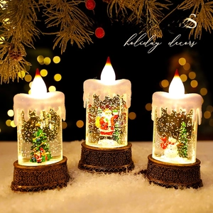 Three LED Christmas snow globe lanterns featuring Santa, Snowman, and Tree with warm lights