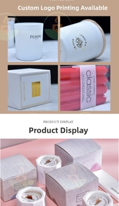 Detail view of pink 20cm drip-less dinner candles with elegant marble gift packaging