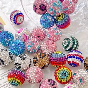Macro shot of assorted colorful sparkling rhinestone pavé beads for DIY jewelry making