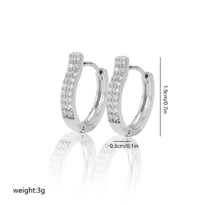 Detail view of silver U-shaped earrings with micro-pave cubic zirconia and dimensions
